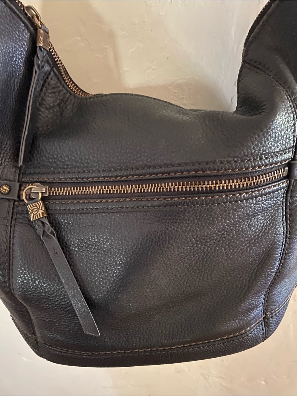 The Sak Black Pebbled Leather Shoulder Hobo with Brass Accent